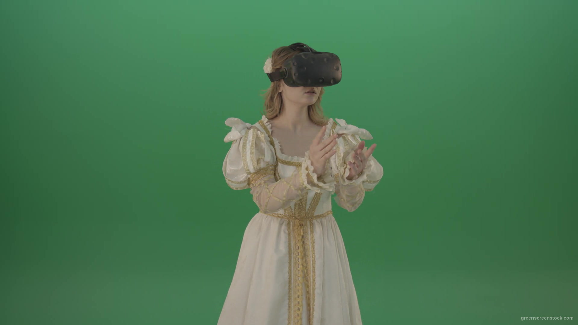 Girl-in-3-in-virtual-reality-has-swallowed-up-in-another-three-dimensional-world-isolated-on-green-screen-1920_009 Green Screen Stock