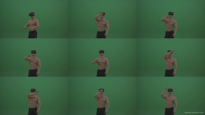 Young_Athletic_Bodybuilder_Working_On_Touch_Pad_Using_Virtual_Reality_Kit_On_Green_Screen_Wall_Background-1920 Green Screen Stock
