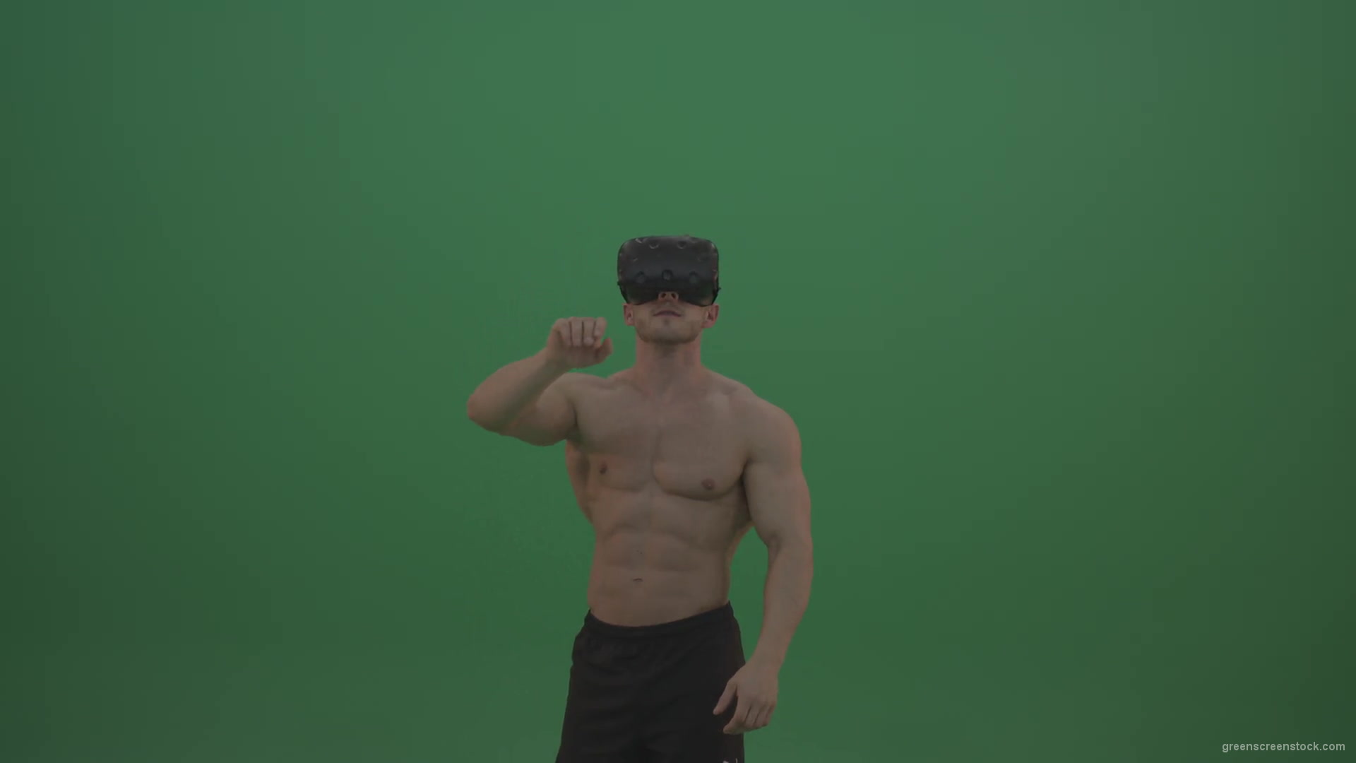 Young_Athletic_Bodybuilder_Working_On_Touch_Pad_Using_Virtual_Reality_Kit_On_Green_Screen_Wall_Background-1920_004 Green Screen Stock