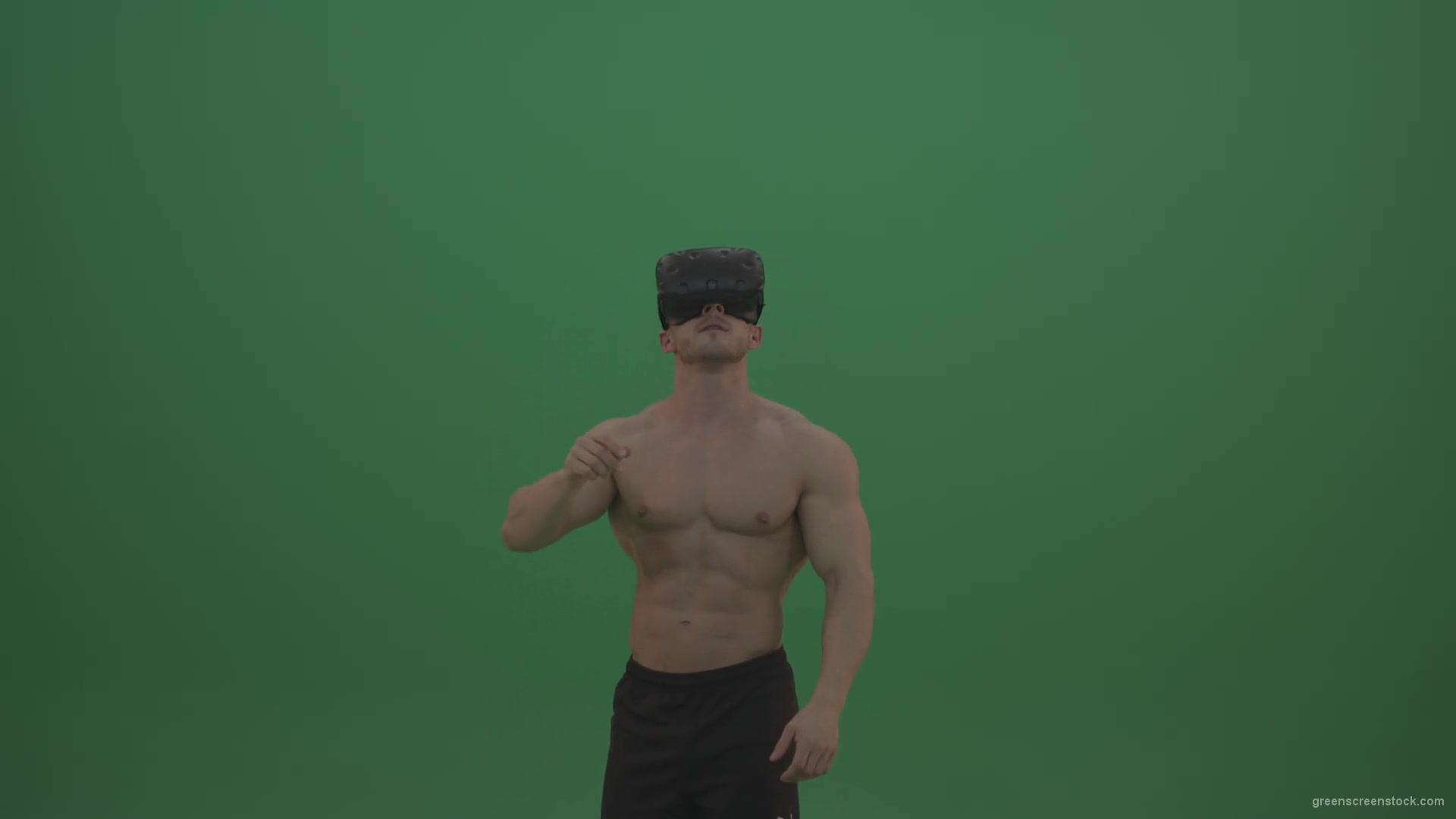 Young_Athletic_Bodybuilder_Working_On_Touch_Pad_Using_Virtual_Reality_Kit_On_Green_Screen_Wall_Background-1920_005 Green Screen Stock