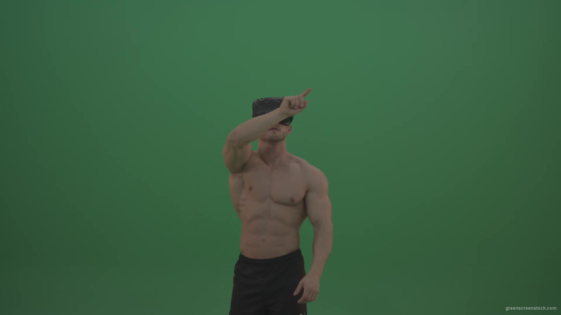 Young_Athletic_Bodybuilder_Working_On_Touch_Pad_Using_Virtual_Reality_Kit_On_Green_Screen_Wall_Background-1920_006 Green Screen Stock