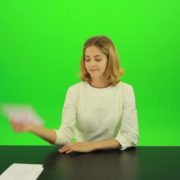 Blonde-hair-girl-in-white-shirt-give-3-point-mark-score-Full-HD-Green-Screen-Video-Footage_007 Green Screen Stock