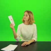 Blonde-shy-jury-gives-two-2-points-mark-Full-HD-Green-Screen-Video-Footage_005 Green Screen Stock