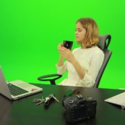 Business-Woman-Relaxing-and-Drinking-Coffee-after-Hard-Work-Green-Screen-Footage_006 Green Screen Stock