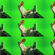 Laughing-Woman-Working-on-the-Computer-Green-Screen-Footage Green Screen Stock