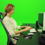 Laughing-Woman-Working-on-the-Computer-Green-Screen-Footage_001 Green Screen Stock