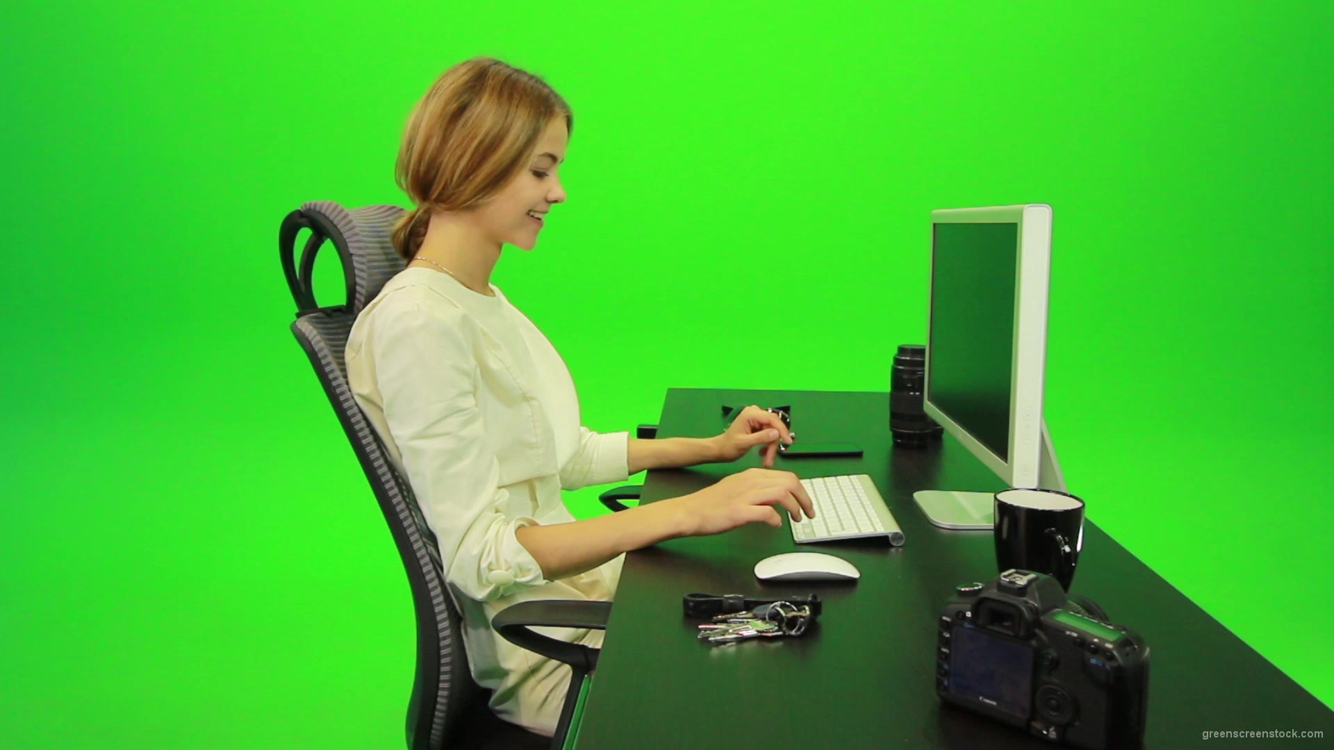 Laughing-Woman-Working-on-the-Computer-Green-Screen-Footage_006 Green Screen Stock
