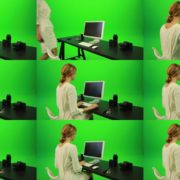 Woman-Sits-Down-and-Works-on-the-Computer-Green-Screen-Footage Green Screen Stock