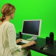 Woman-Sits-Down-and-Works-on-the-Computer-Green-Screen-Footage_005 Green Screen Stock