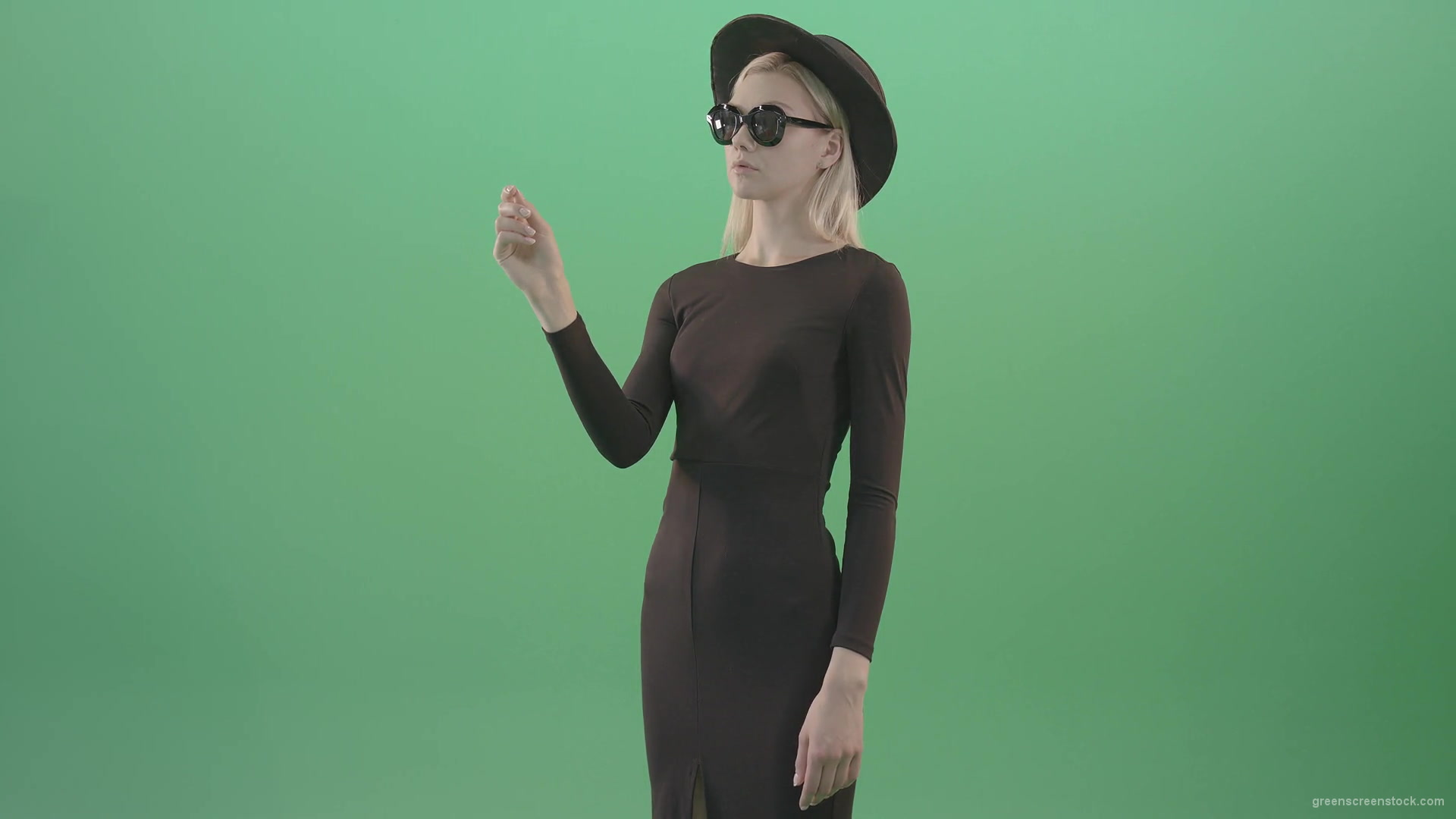 Awesome-beautiful-luxury-women-in-black-dress-shopping-virtual-products-on-touch-screen-4K-Green-Screen-Video-Footage-1920_004 Green Screen Stock