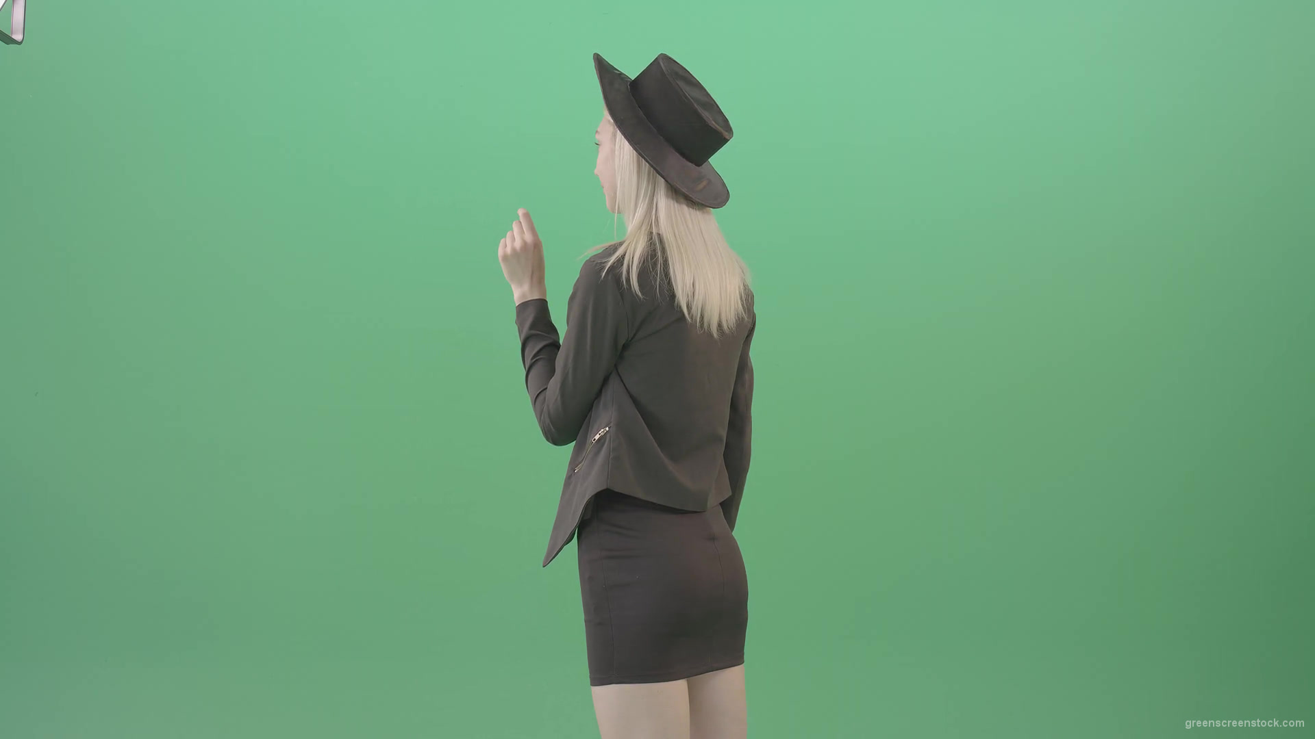Back-view-black-costume-blonde-girl-looking-virtual-products-on-touch-screen-4K-Green-Screen-Video-Footage-1920_008 Green Screen Stock