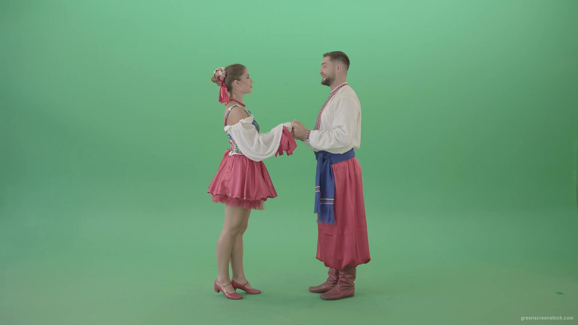 Beautiful-Ukrainian-couple-speaking-about-love-in-ethno-costumes-isolated-on-green-screen-4K-Video-Footage-1920_004 Green Screen Stock
