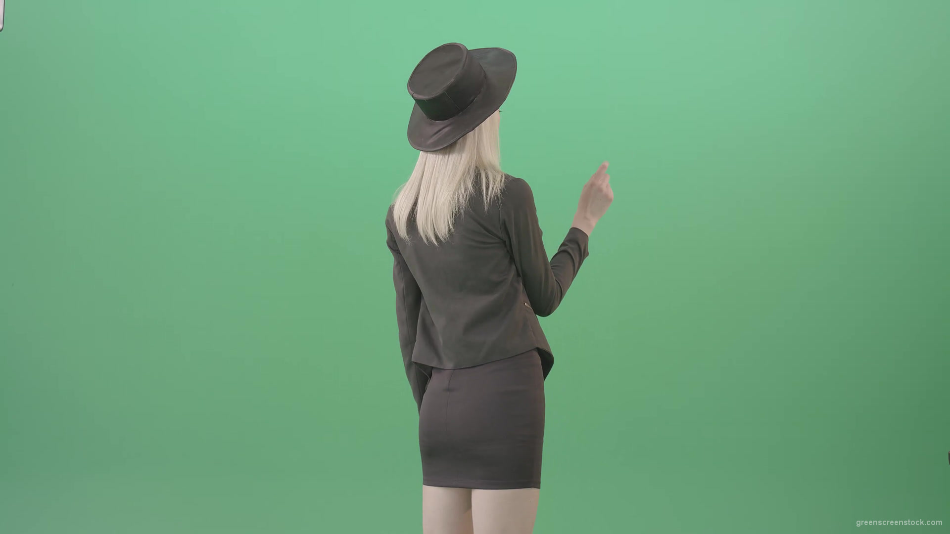 Blonde-Girl-looking-digital-virtual-products-on-touch-screen-from-back-side-4K-Green-Screen-Video-Footage-1920_004 Green Screen Stock