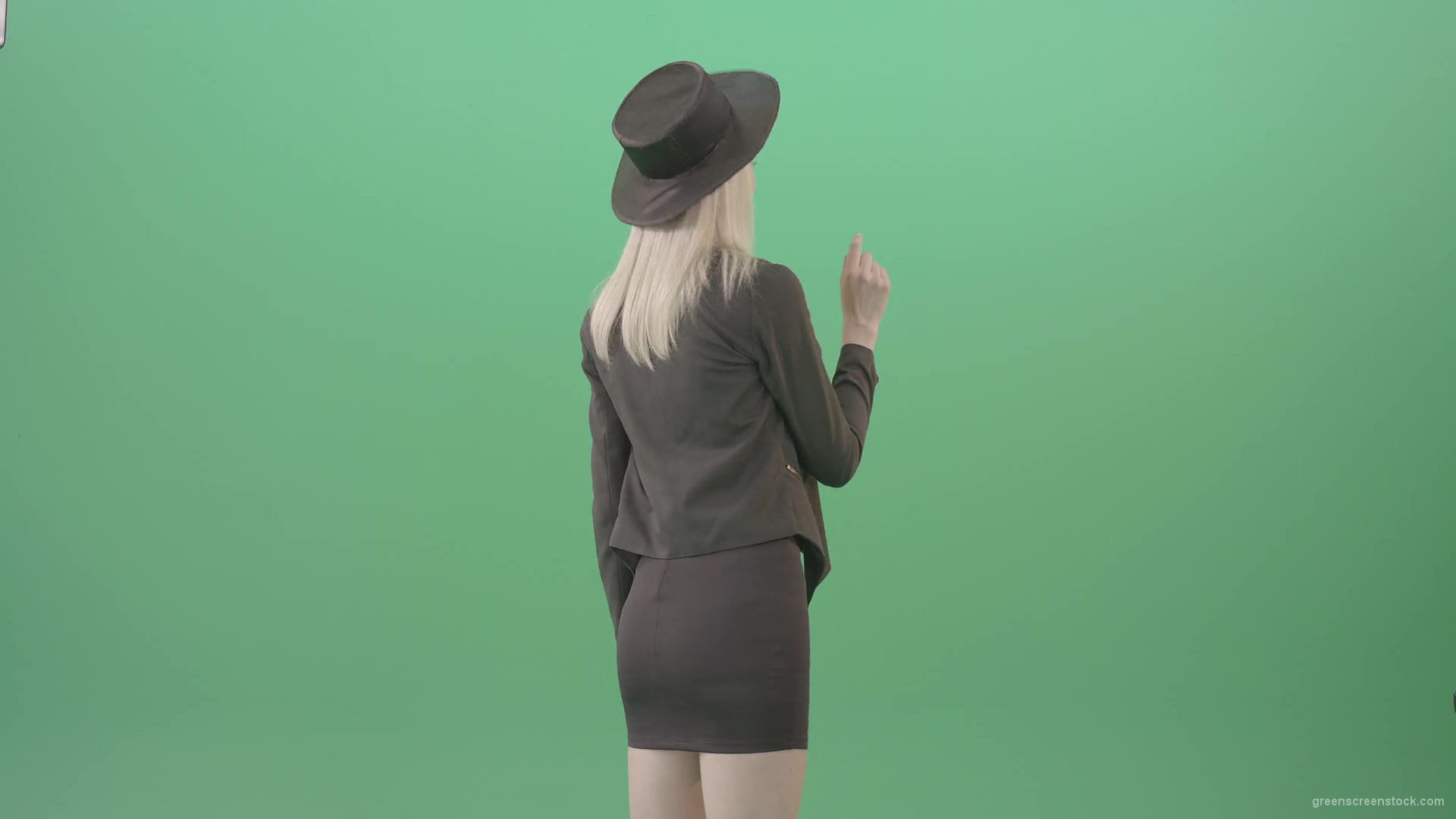 Blonde-Girl-looking-digital-virtual-products-on-touch-screen-from-back-side-4K-Green-Screen-Video-Footage-1920_009 Green Screen Stock