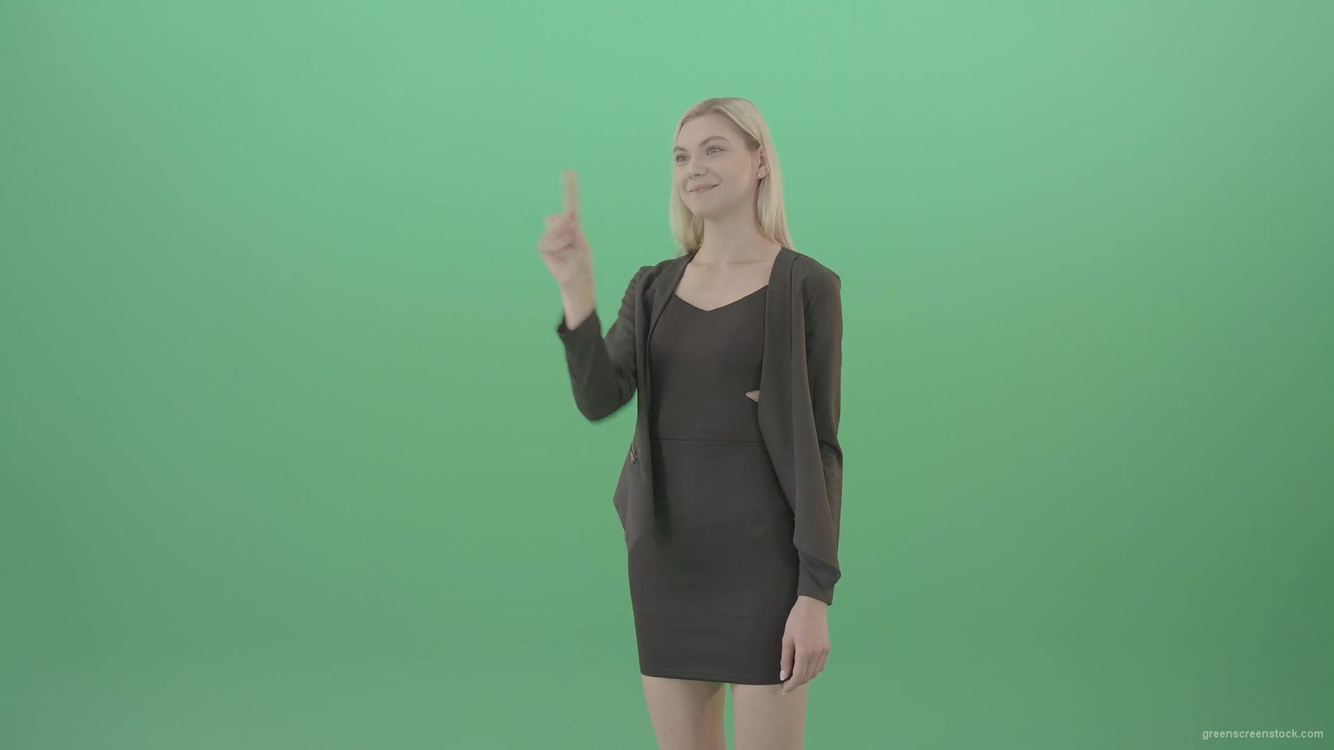 Blonde-girl-in-black-costume-slide-virtual-products-in-touch-display-on-green-screen-4K-Video-Footage-1920_008 Green Screen Stock