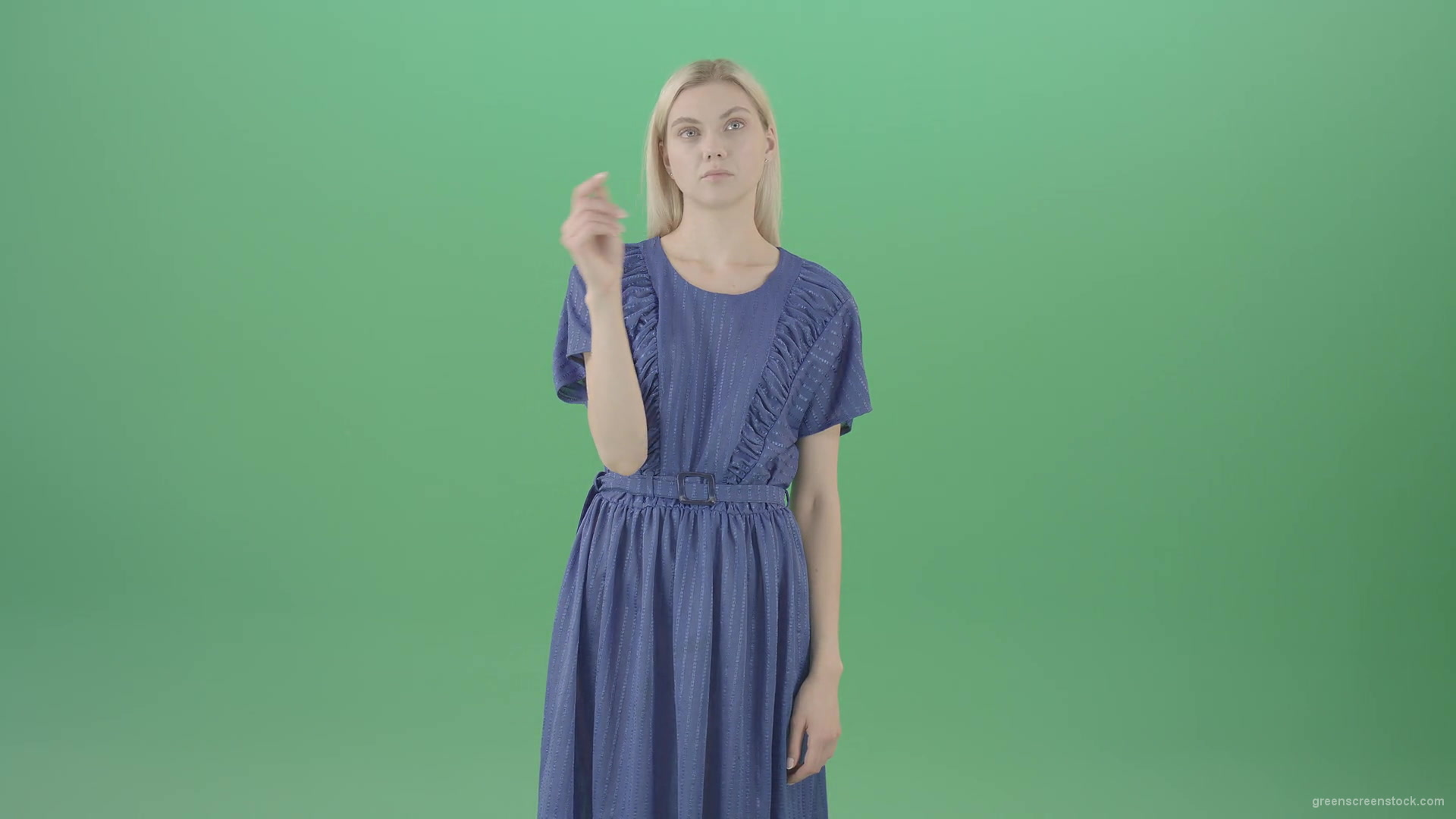 Boring-blonde-girl-in-blue-costume-can-not-find-virtual-products-on-touch-screen-isolated-on-green-background-4K-Video-Footage--1920_002 Green Screen Stock