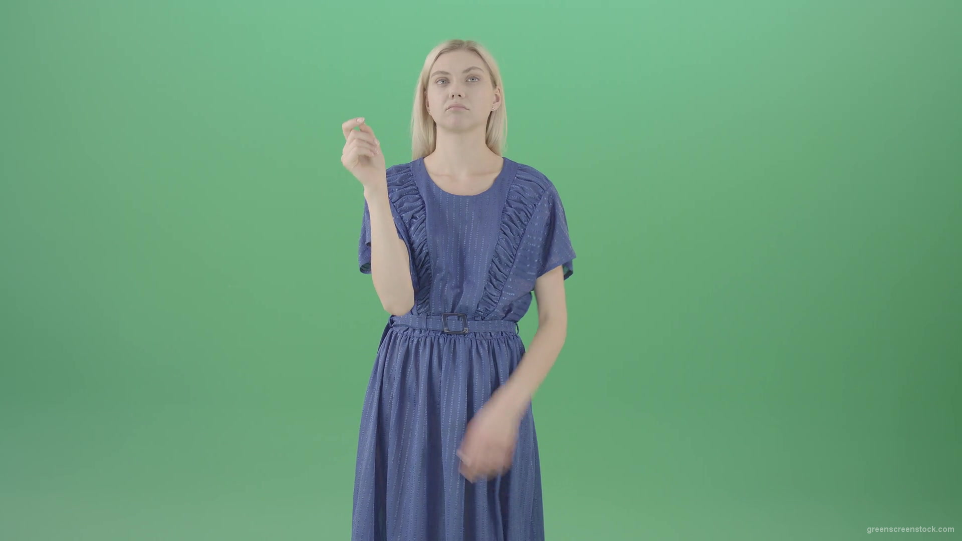 Boring-blonde-girl-in-blue-costume-can-not-find-virtual-products-on-touch-screen-isolated-on-green-background-4K-Video-Footage--1920_005 Green Screen Stock