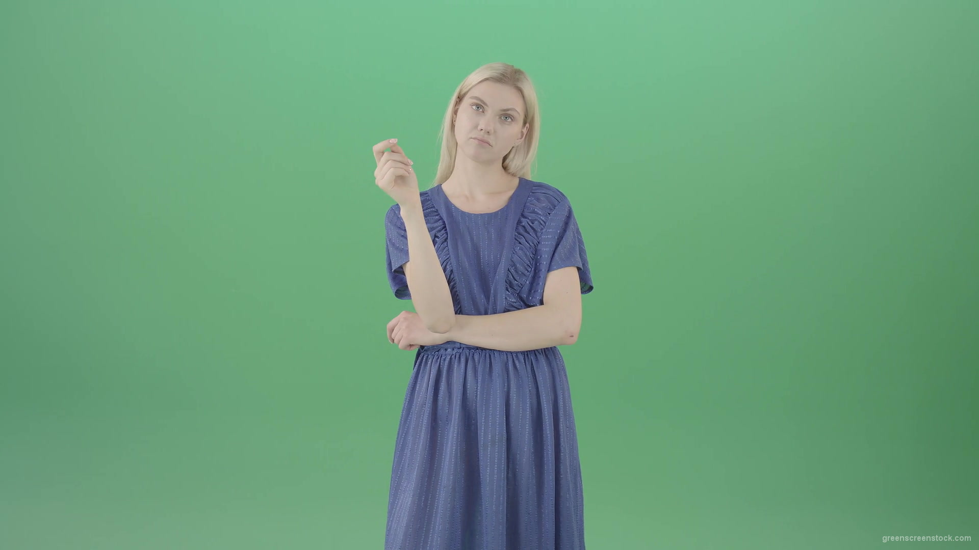 Boring-blonde-girl-in-blue-costume-can-not-find-virtual-products-on-touch-screen-isolated-on-green-background-4K-Video-Footage--1920_006 Green Screen Stock