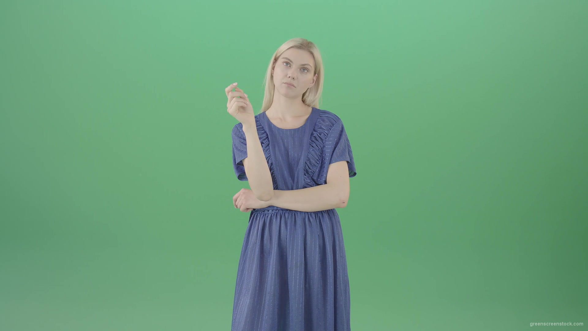 Boring-blonde-girl-in-blue-costume-can-not-find-virtual-products-on-touch-screen-isolated-on-green-background-4K-Video-Footage--1920_007 Green Screen Stock