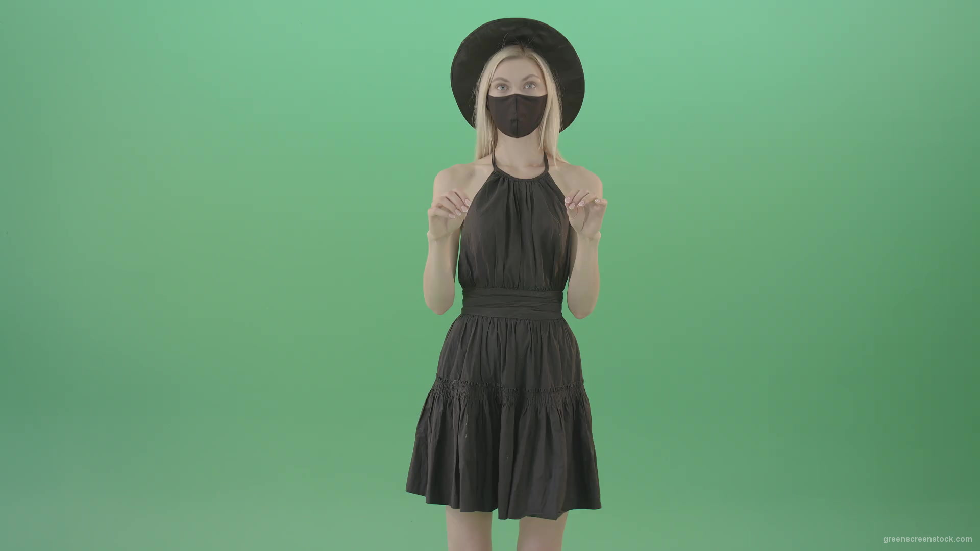 Covid-19-girl-in-black-mask-working-on-virtual-keyboard-buttons-and-touch-screen-on-green-background-4K-Video-Footage-1920_001 Green Screen Stock