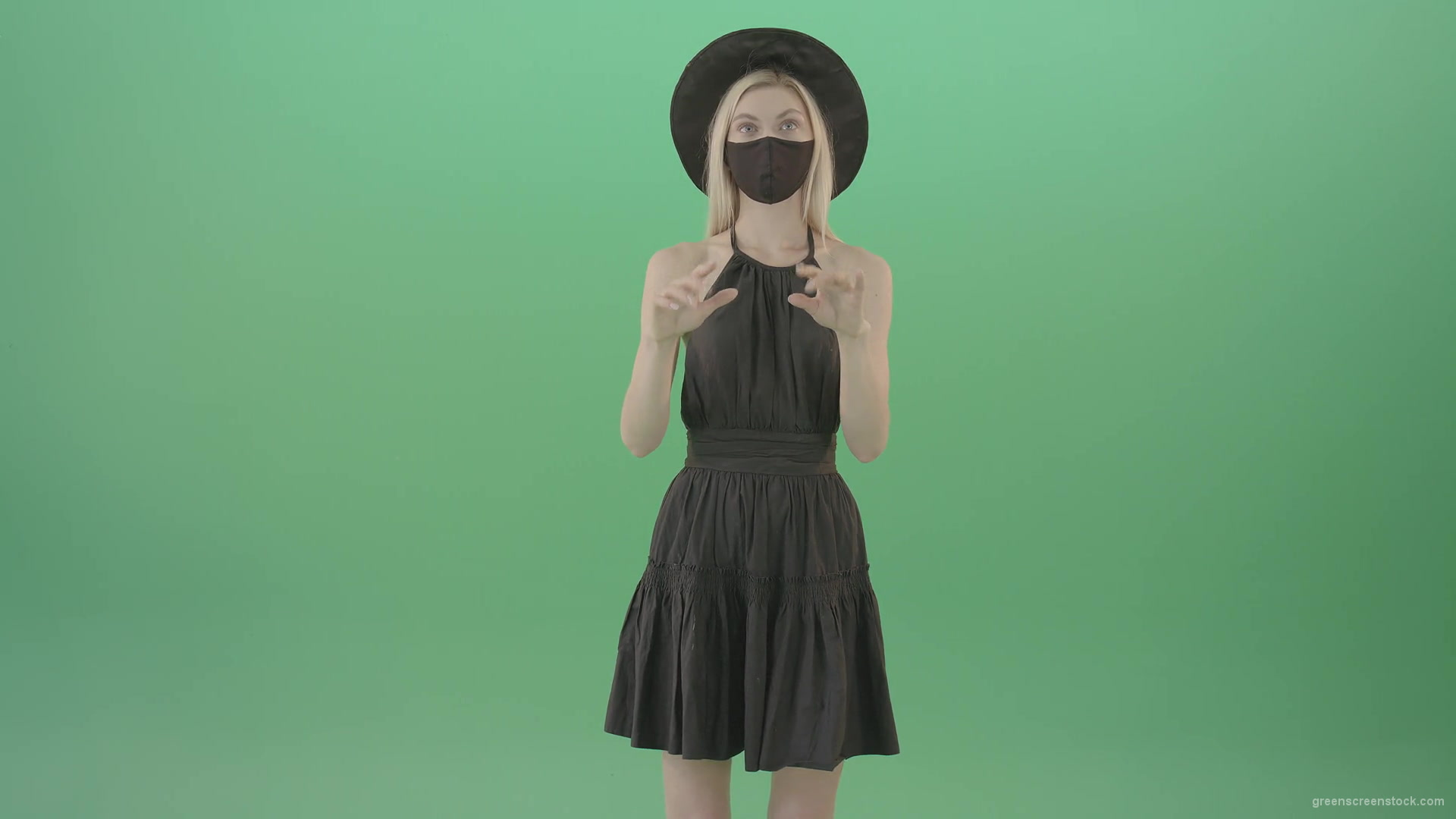 Covid-19-girl-in-black-mask-working-on-virtual-keyboard-buttons-and-touch-screen-on-green-background-4K-Video-Footage-1920_002 Green Screen Stock