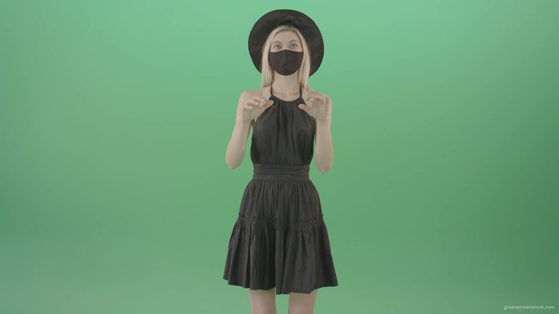 Covid-19-girl-in-black-mask-working-on-virtual-keyboard-buttons-and-touch-screen-on-green-background-4K-Video-Footage-1920_006 Green Screen Stock