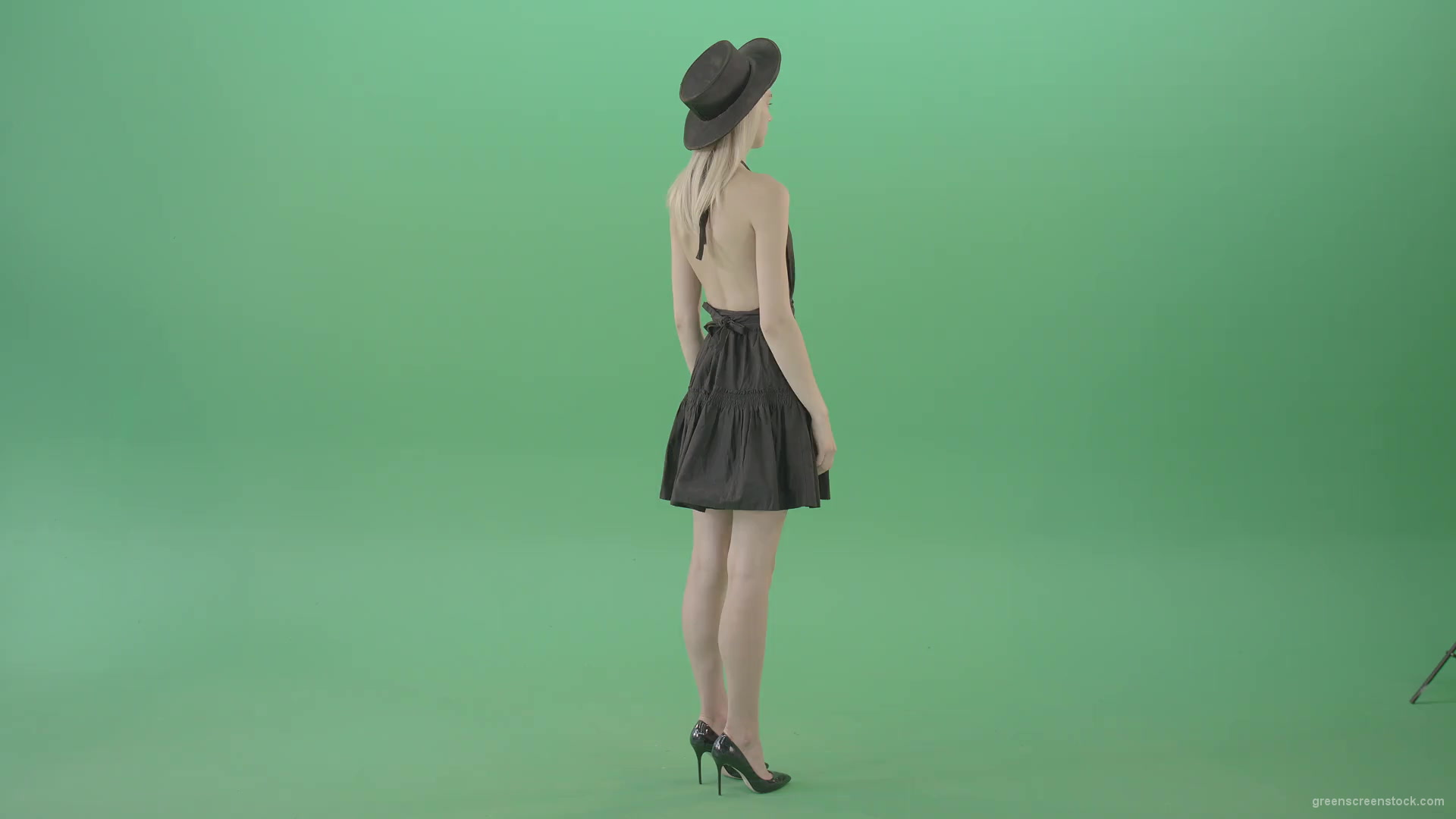 Full-size-fashion-girl-looking-virtual-products-on-touch-green-screen-4K-Video-Footage-1920_001 Green Screen Stock