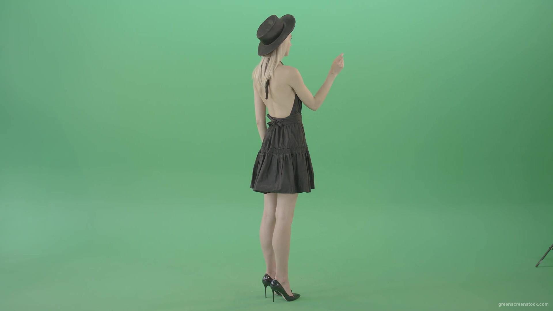 Full-size-fashion-girl-looking-virtual-products-on-touch-green-screen-4K-Video-Footage-1920_004 Green Screen Stock