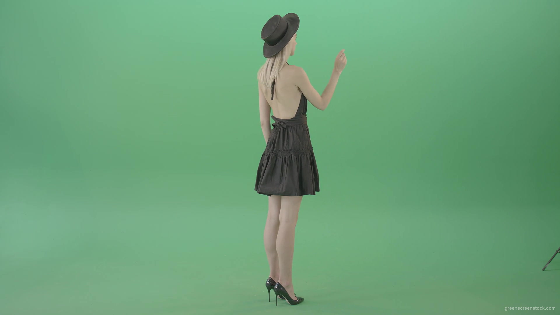 Full-size-fashion-girl-looking-virtual-products-on-touch-green-screen-4K-Video-Footage-1920_007 Green Screen Stock
