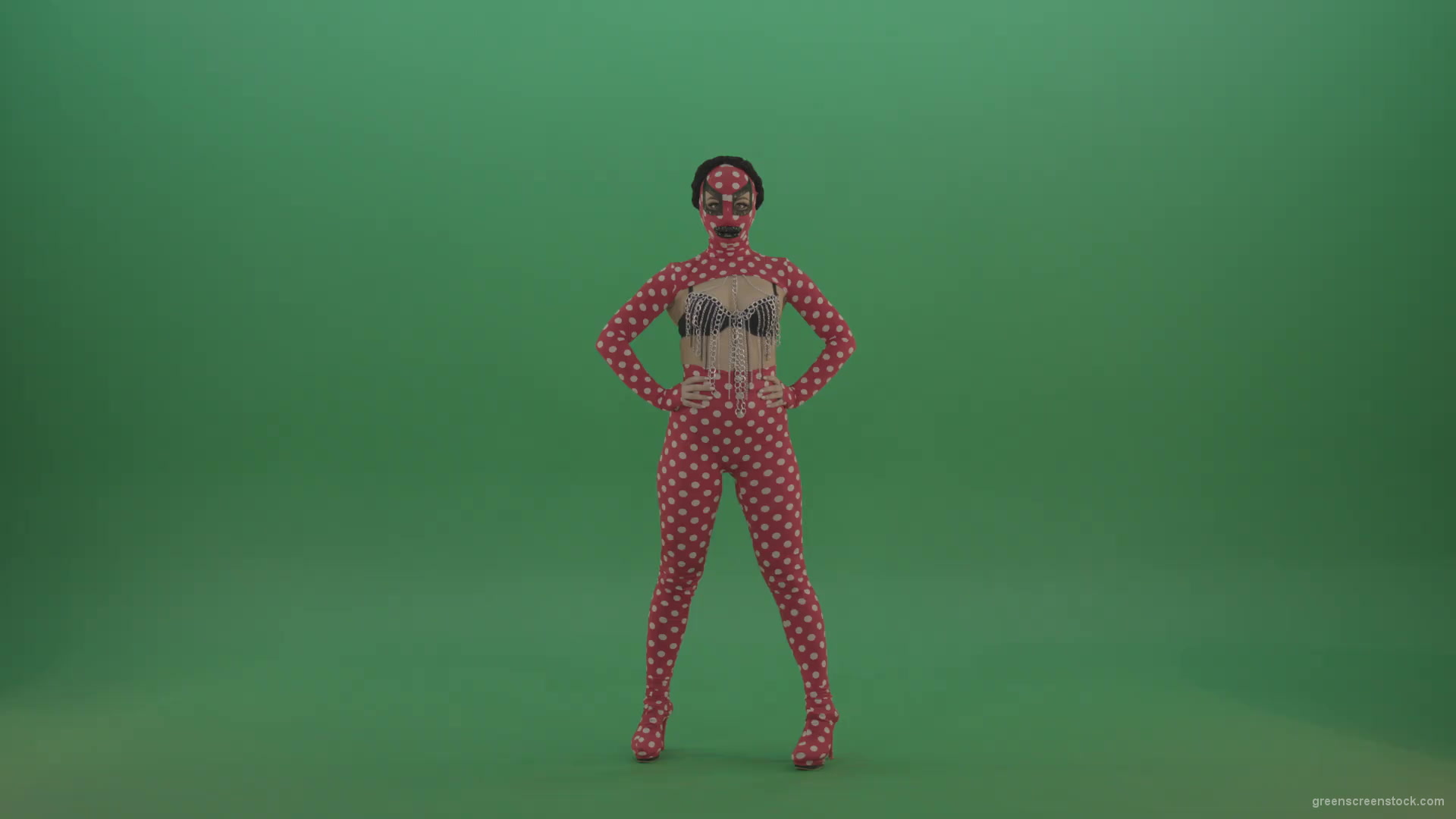 Girl-with-big-black-lipps-and-red-fetish-costume-posing-and-sitting-down-on-green-screen-1920_001 Green Screen Stock