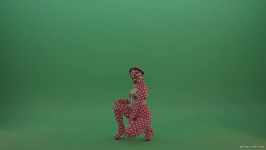 vj video background Girl-with-big-black-lipps-and-red-fetish-costume-posing-and-sitting-down-on-green-screen-1920_003