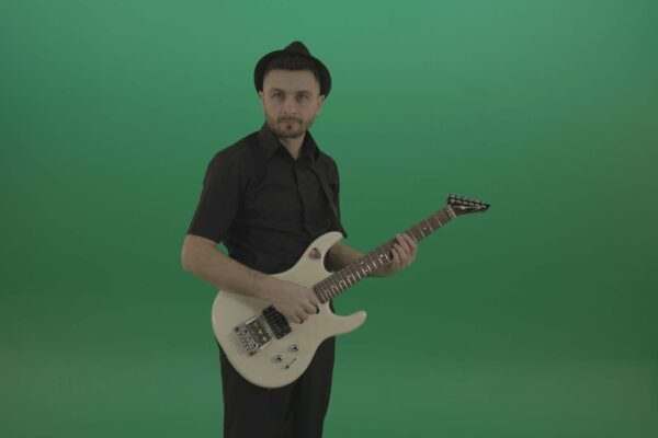rocker man play guitar on green screen