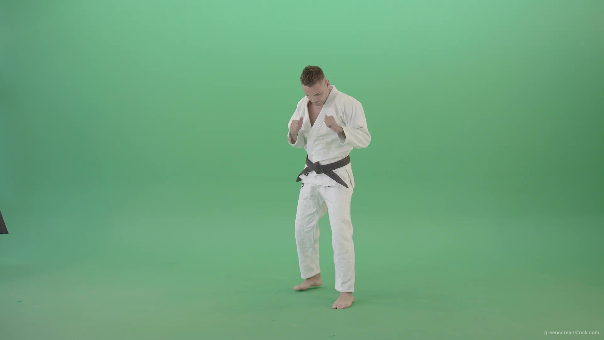 Jujutsu-Sportman-make-front-kick-and-punch-isolated-on-green-screen-4K-Video-Footage-1920_001 Green Screen Stock