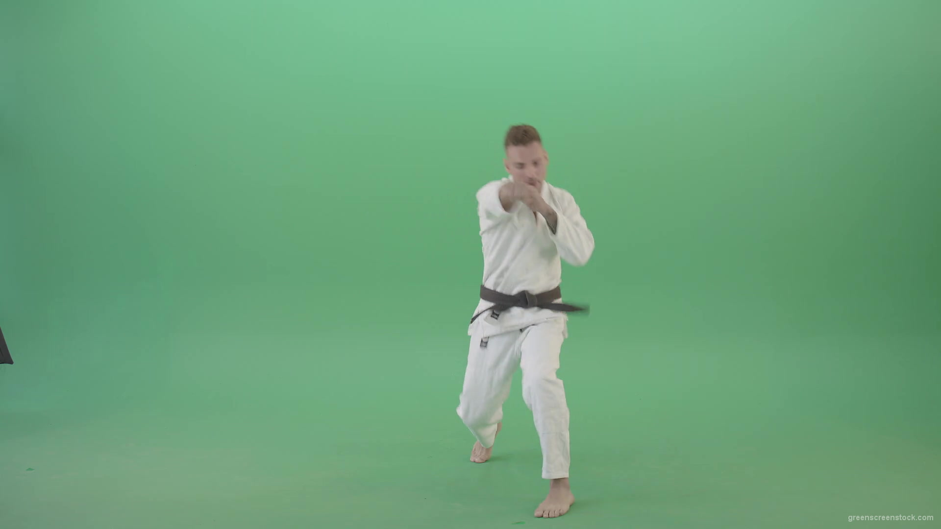 Jujutsu-Sportman-make-front-kick-and-punch-isolated-on-green-screen-4K-Video-Footage-1920_002 Green Screen Stock