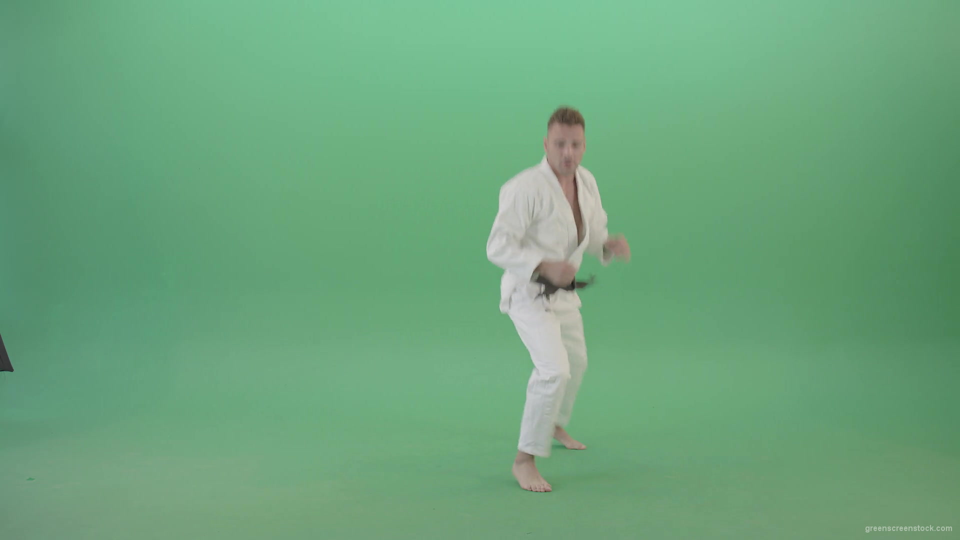 Jujutsu-Sportman-make-front-kick-and-punch-isolated-on-green-screen-4K-Video-Footage-1920_004 Green Screen Stock