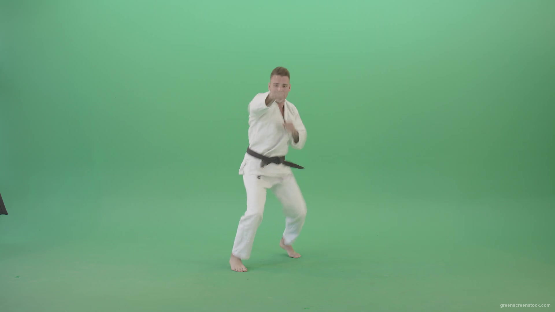 Jujutsu-Sportman-make-front-kick-and-punch-isolated-on-green-screen-4K-Video-Footage-1920_008 Green Screen Stock
