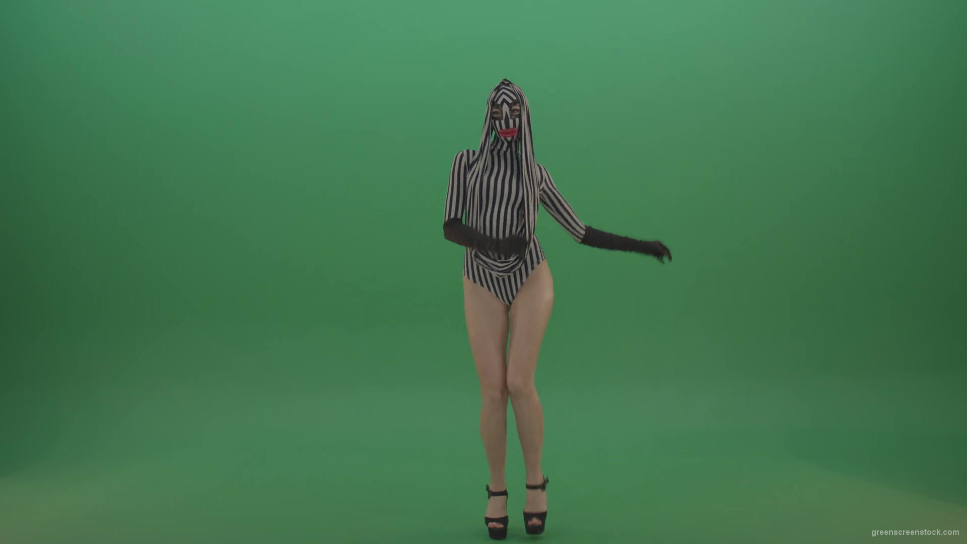 Long-legs-girl-march-in-white-black-stripe-costume-and-mask-on-green-screen-1920_008 Green Screen Stock