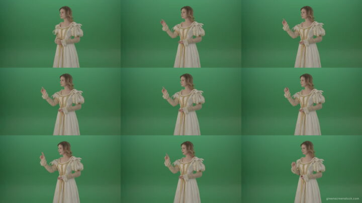 Satisfied-woman-in-a-medieval-dress-flips-a-touchscreen-and-smiles-isolated-on-green-background-1920 Green Screen Stock