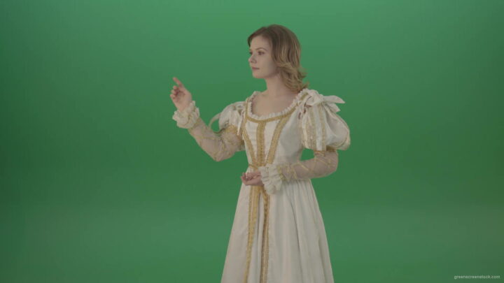 vj video background Satisfied-woman-in-a-medieval-dress-flips-a-touchscreen-and-smiles-isolated-on-green-background-1920_003