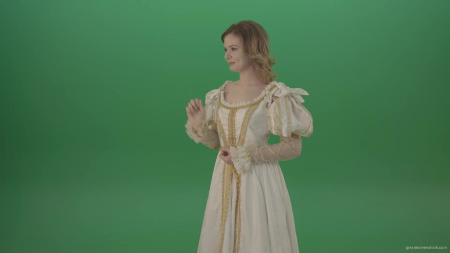 Satisfied-woman-in-a-medieval-dress-flips-a-touchscreen-and-smiles-isolated-on-green-background-1920_009 Green Screen Stock