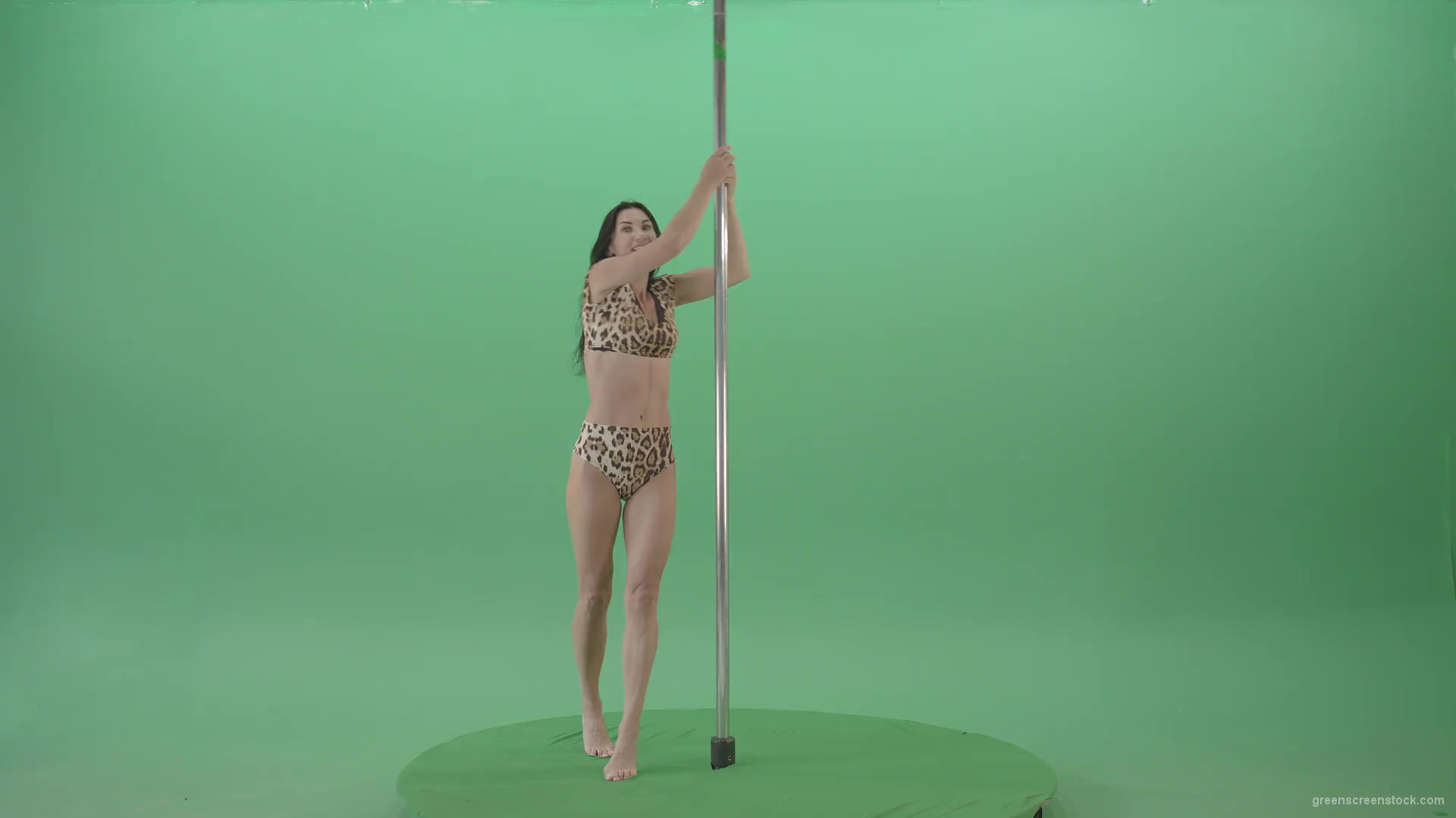 Adult-female-model-sport-girl-in-leopard-underwear-spinning-on-pilon-over-Green-Screen-4K-Video-Footage-1920_001 Green Screen Stock