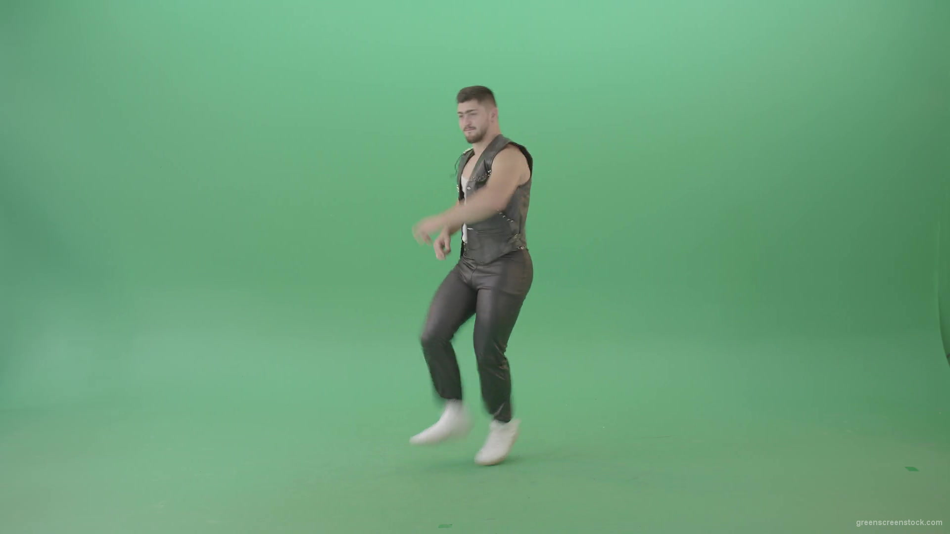 Angry-caucasian-Man-in-Black-leather-costume-dancing-Pop-Moves-on-Green-Screen-4K-Video-Footage-1920_002 Green Screen Stock