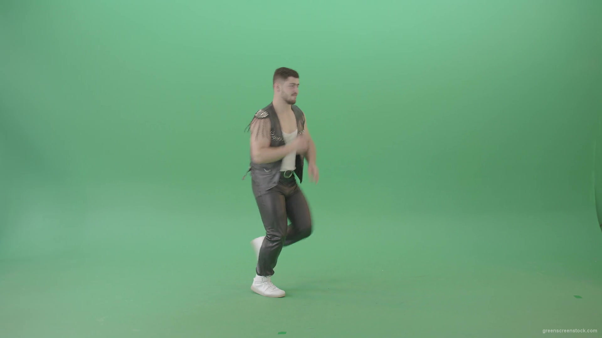 Angry-caucasian-Man-in-Black-leather-costume-dancing-Pop-Moves-on-Green-Screen-4K-Video-Footage-1920_004 Green Screen Stock
