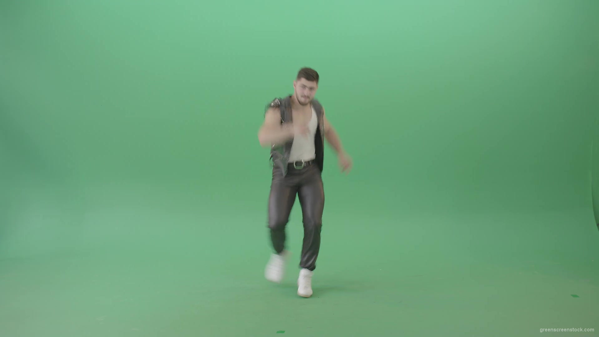 Angry-caucasian-Man-in-Black-leather-costume-dancing-Pop-Moves-on-Green-Screen-4K-Video-Footage-1920_008 Green Screen Stock