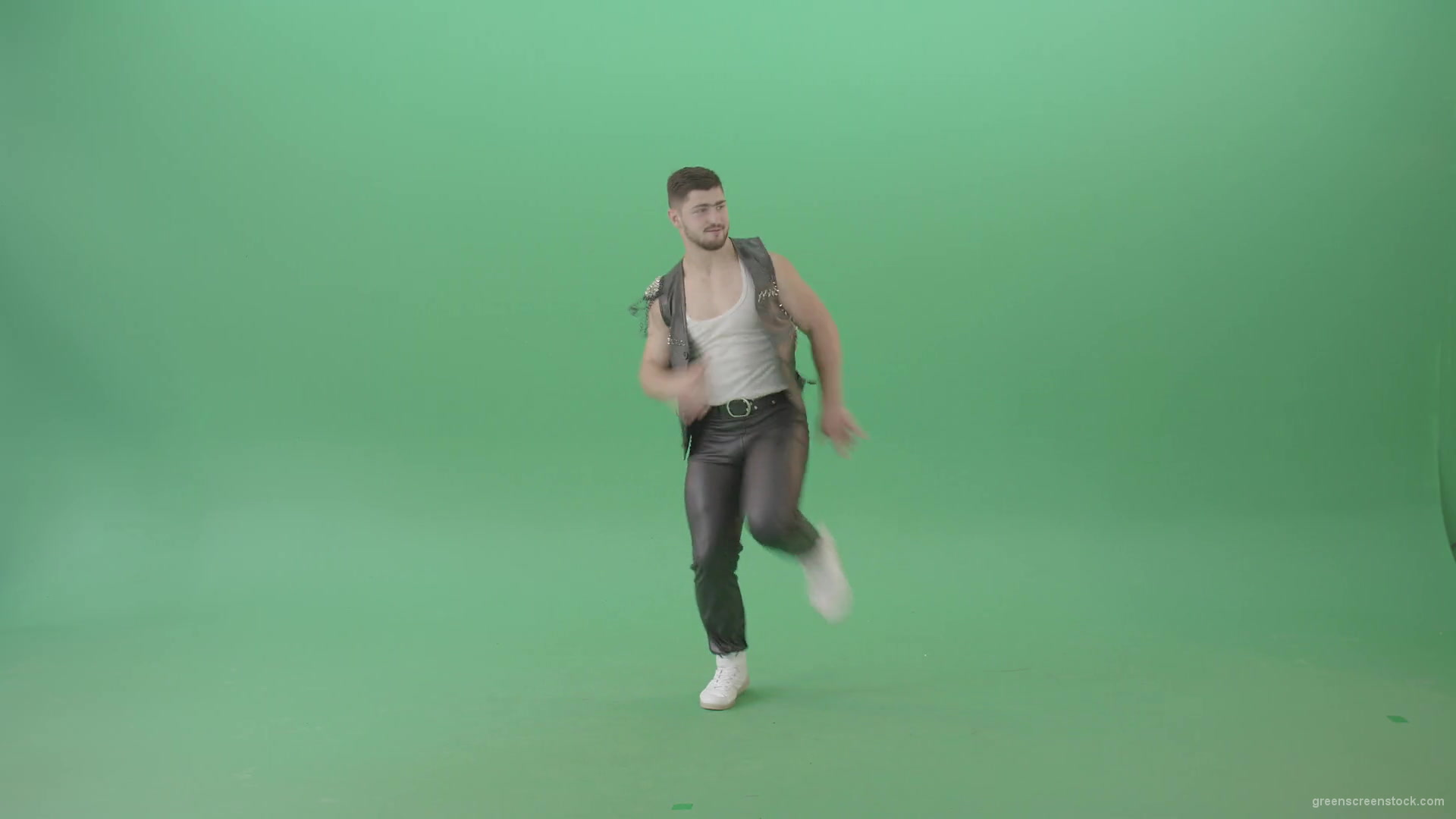Angry-caucasian-Man-in-Black-leather-costume-dancing-Pop-Moves-on-Green-Screen-4K-Video-Footage-1920_009 Green Screen Stock