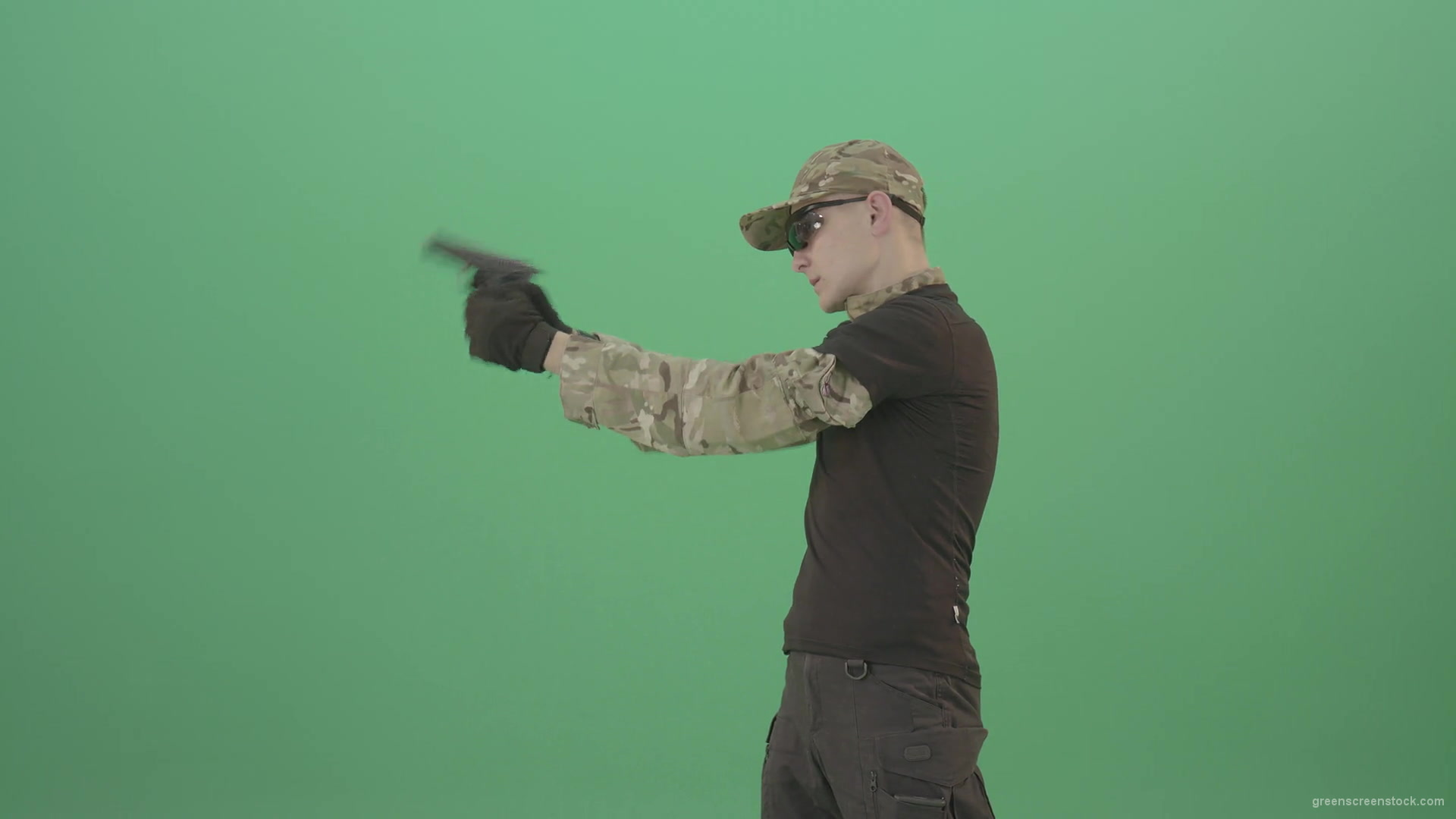 Army-Man-Assassin-shooting-with-small-gun-isolated-on-green-screen-4K-Video-Footage-1920_007 Green Screen Stock