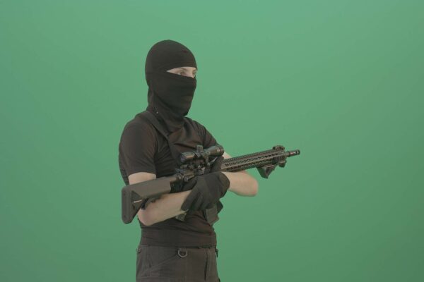 Army strike soldier with gun on green screen