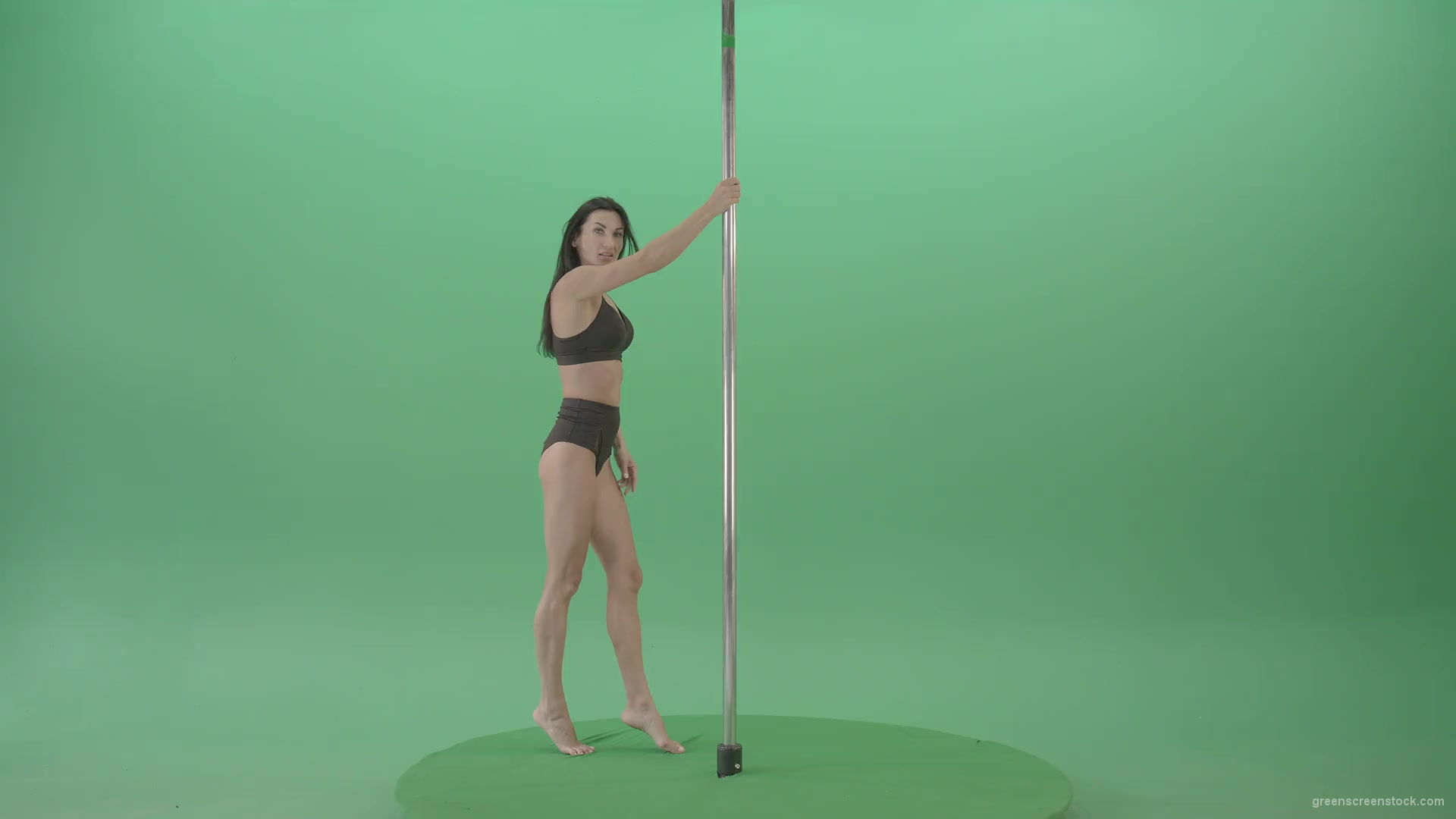 Artistic-gymnast-model-showing-strip-pole-dance-element-on-green-screen-4K-Video-Footage-1920_001 Green Screen Stock