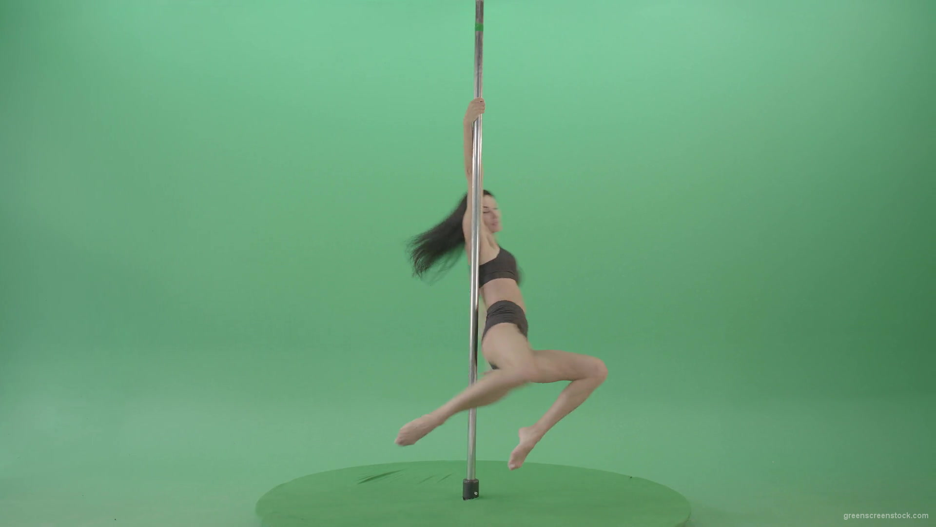 Artistic-gymnast-model-showing-strip-pole-dance-element-on-green-screen-4K-Video-Footage-1920_004 Green Screen Stock