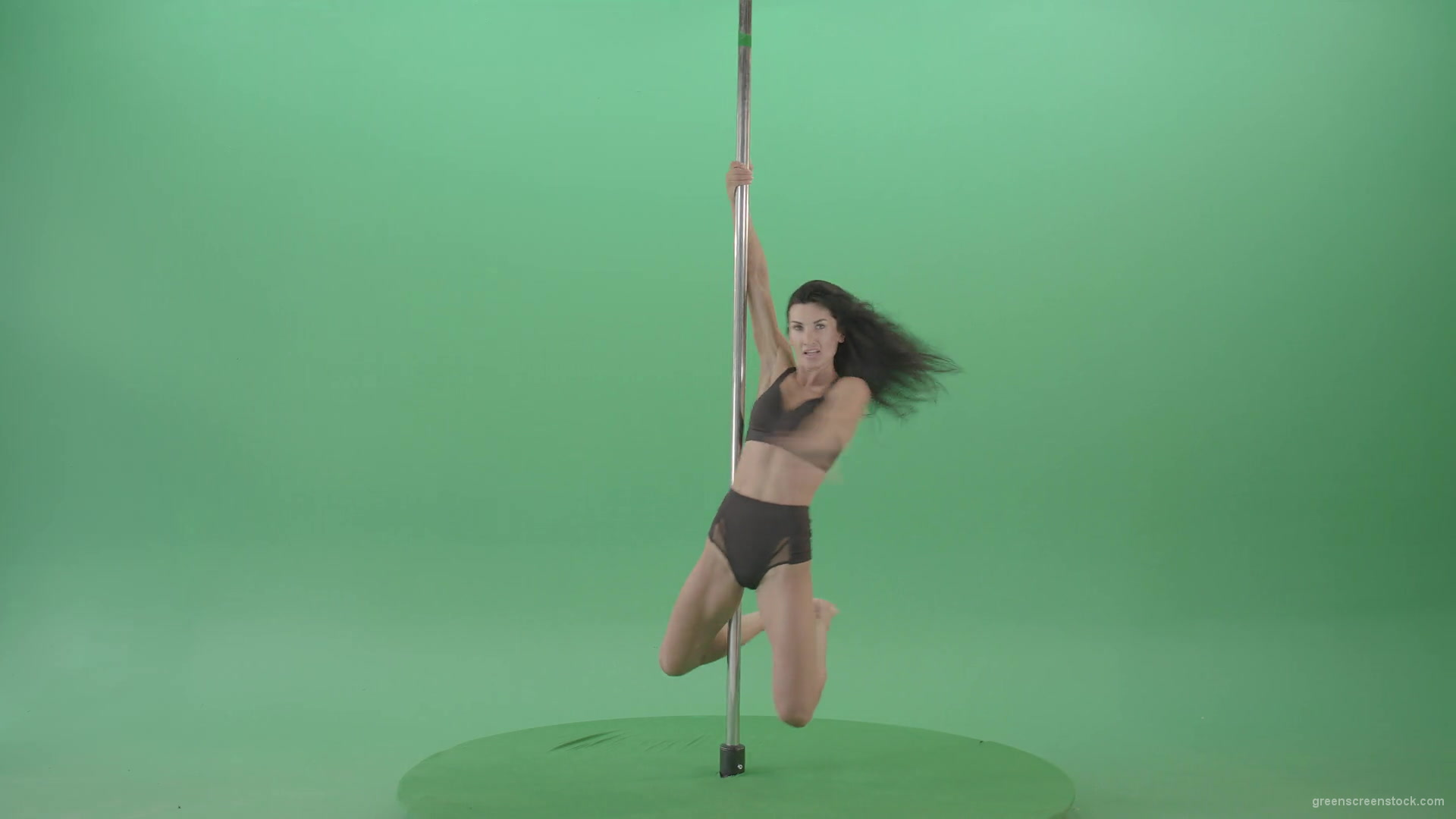 Artistic-gymnast-model-showing-strip-pole-dance-element-on-green-screen-4K-Video-Footage-1920_008 Green Screen Stock